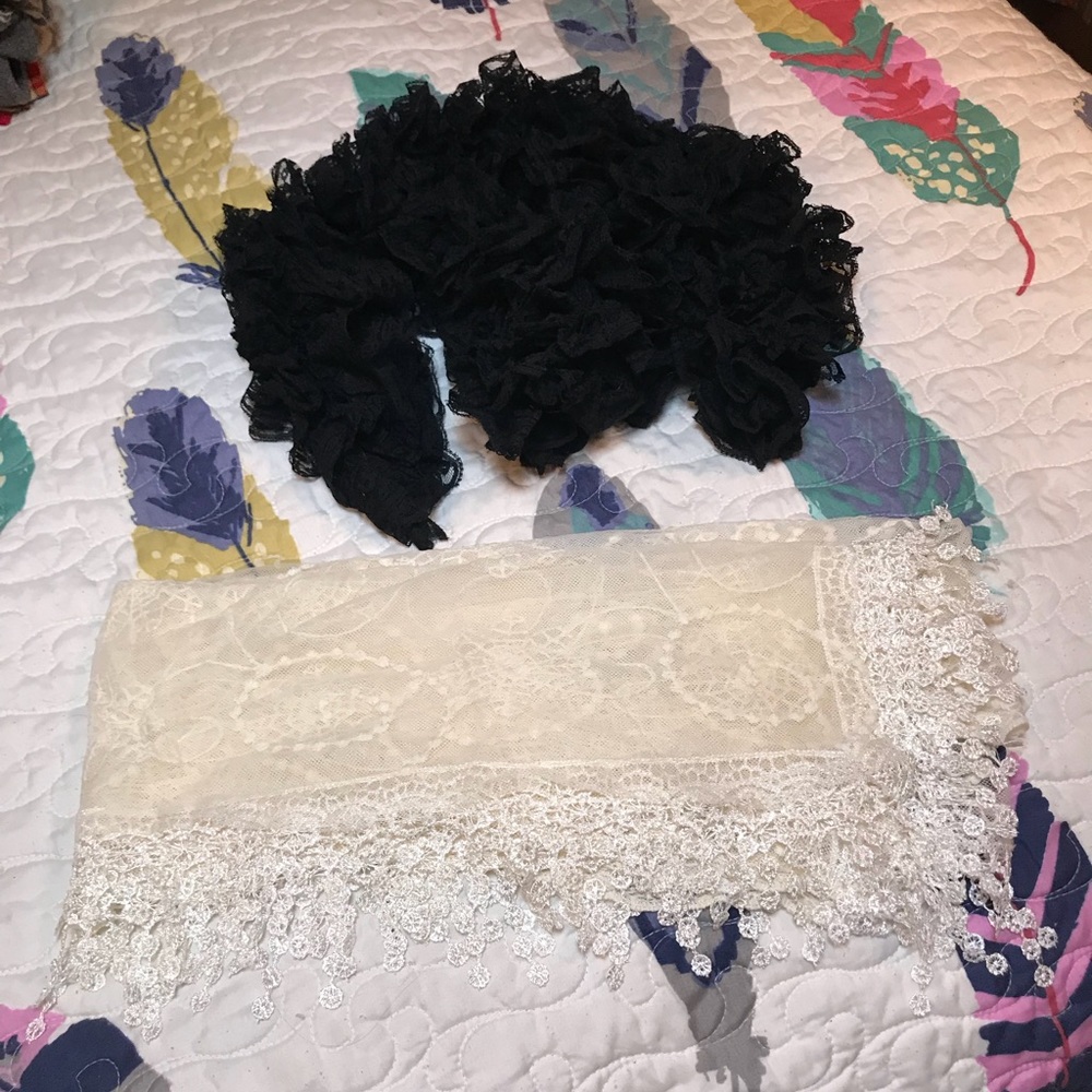 Bundle of lace scarves.